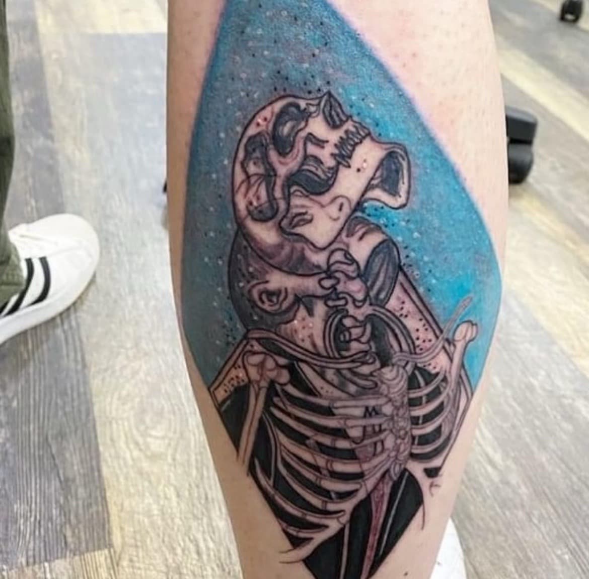 Illustrative + Black & Grey skeleton tattoo on Calf by Bass on TattMe