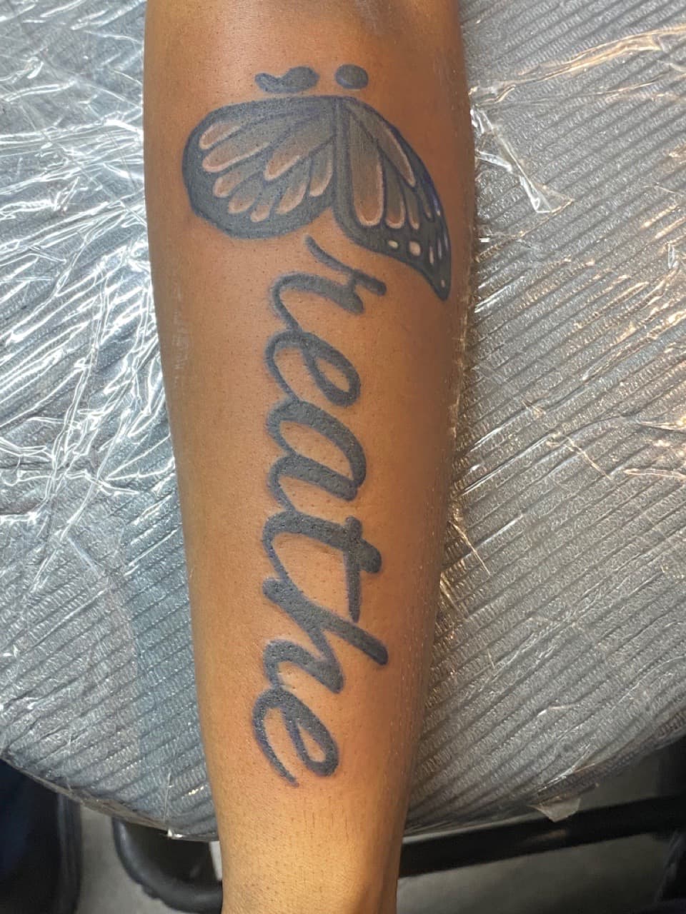Lettering + Script butterfly tattoo on Forearm by InkGuru_Sway on TattMe