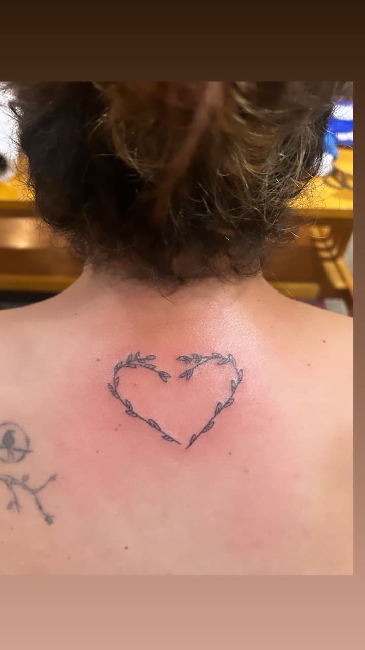 Fine Line + Minimalist heart tattoo on Upper Back by red_rock_designs on TattMe