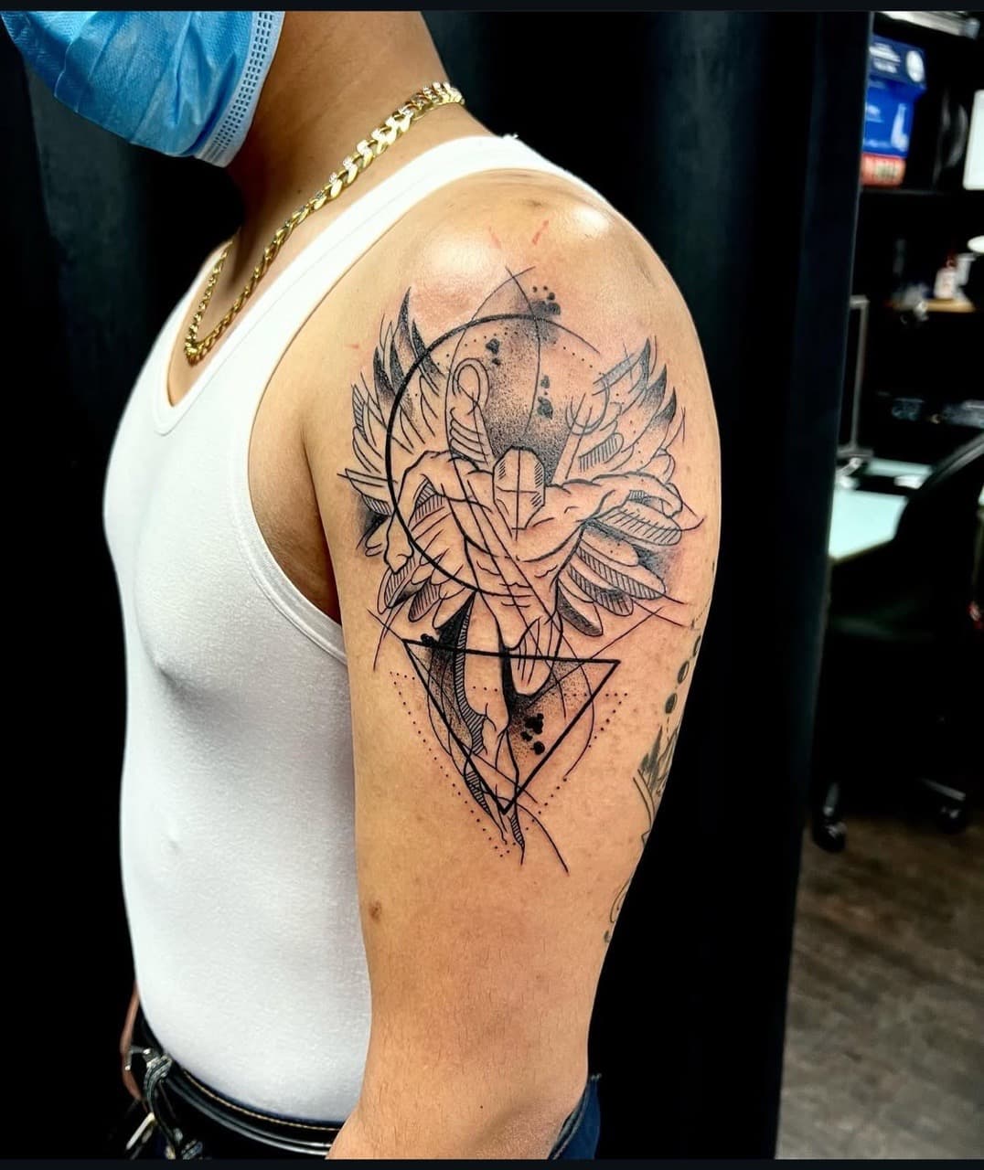 Black & Grey + Geometric angel tattoo on Upper Arm by abutattoo1 on TattMe
