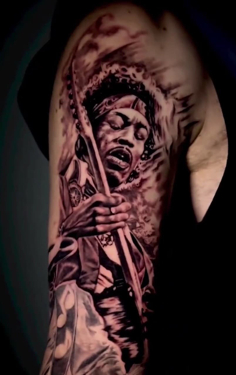 Black & Grey + Realism jimi hendrix tattoo on Upper Arm by XRayVizionz on TattMe