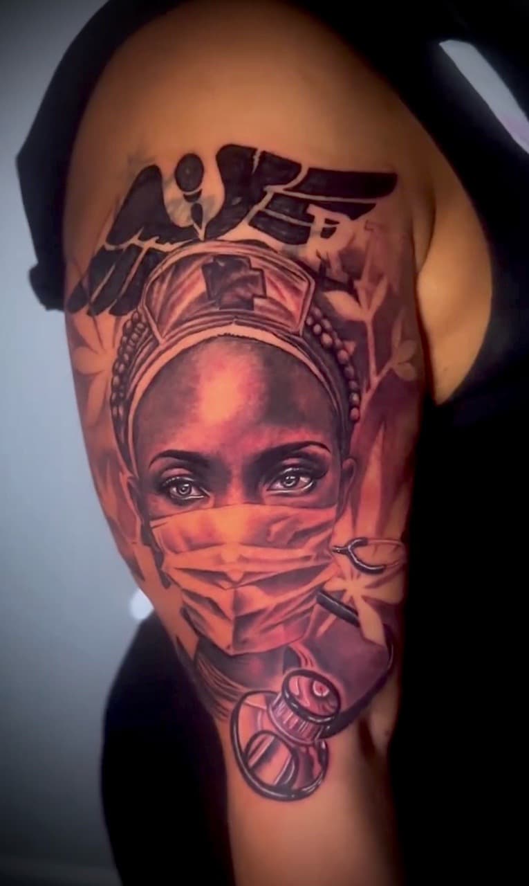Realism + Illustrative nurse tattoo on Upper Arm by XRayVizionz on TattMe