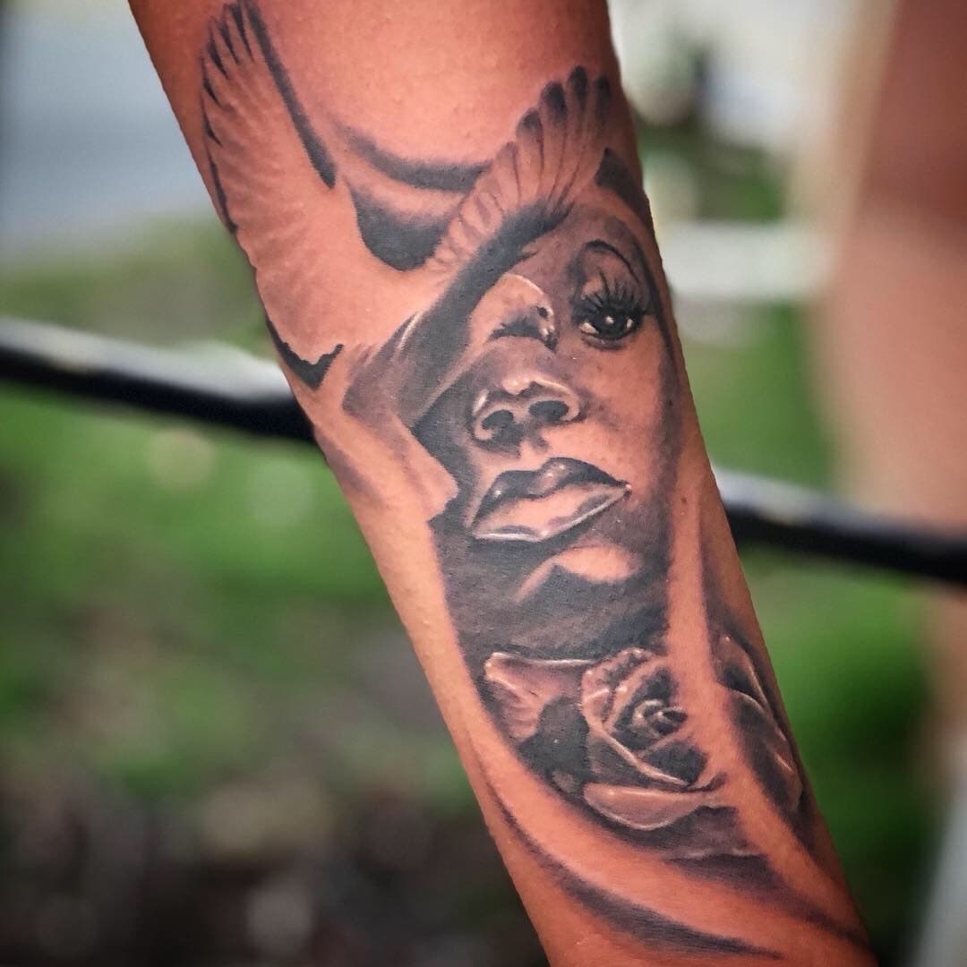 Black & Grey + Realism female face tattoo on Forearm by XRayVizionz on TattMe