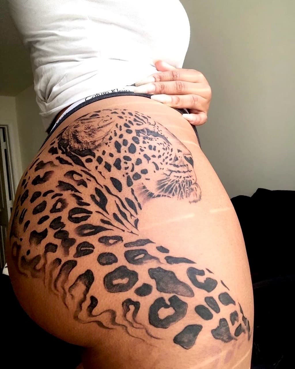 Black & Grey + Realism leopard tattoo on Hip by XRayVizionz on TattMe