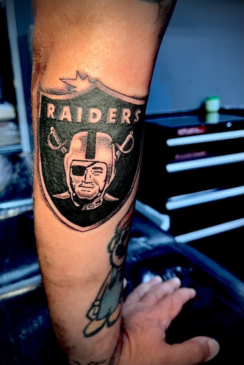 Black & Grey + Pop Culture raiders tattoo on Forearm by graypaint on TattMe