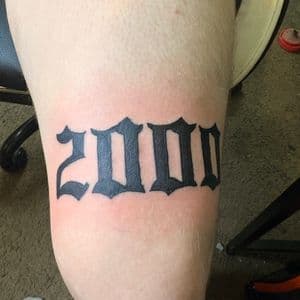 Lettering + Black-work numbers tattoo on Thigh by TattsByBoogzz on TattMe