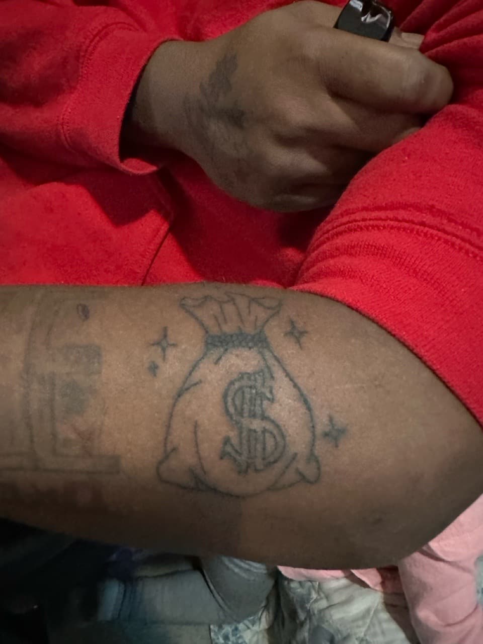 Line-work + Black-work money bag tattoo on Upper Arm by TattsByBoogzz on TattMe