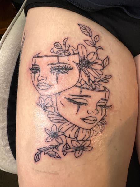 Fine Line + Black-work faces tattoo on Thigh by TattsByBoogzz on TattMe