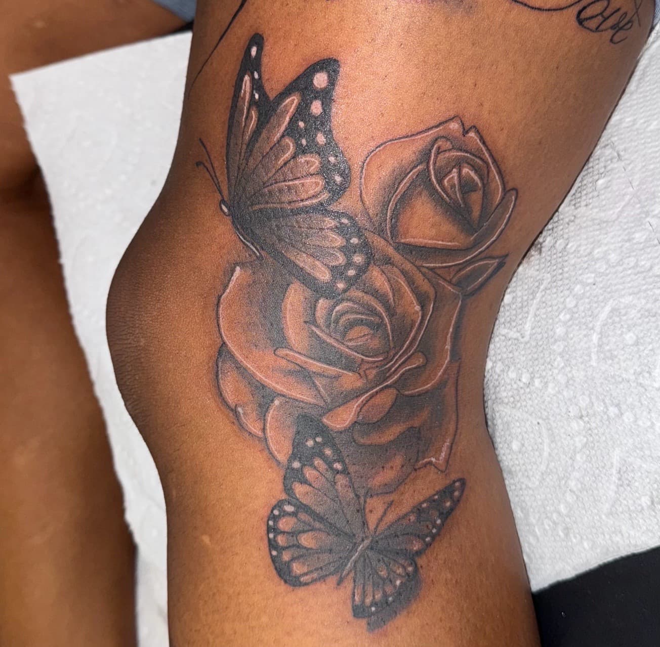 Black & Grey + Floral butterflies tattoo on Knee by Marissa_Marie_Tatts on TattMe