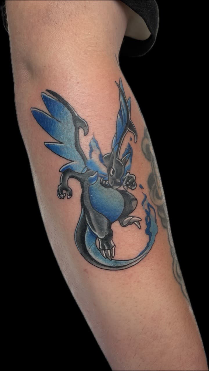 Anime + Pop Culture dragon tattoo on Forearm by Carmela_Bella on TattMe