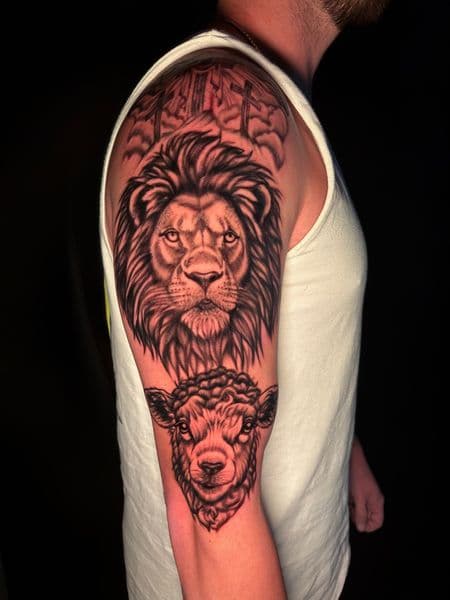Black-work + Neo-Traditional lion tattoo on Upper Arm by Carmela_Bella on TattMe