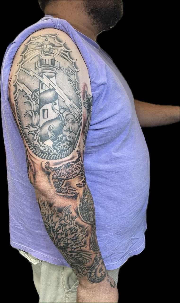 Black & Grey + Neo-Traditional lighthouse tattoo on Full Sleeve by Carmela_Bella on TattMe