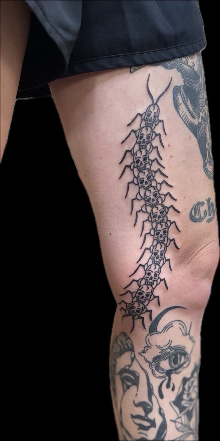 Black-work + Traditional centipede tattoo on Thigh by Carmela_Bella on TattMe