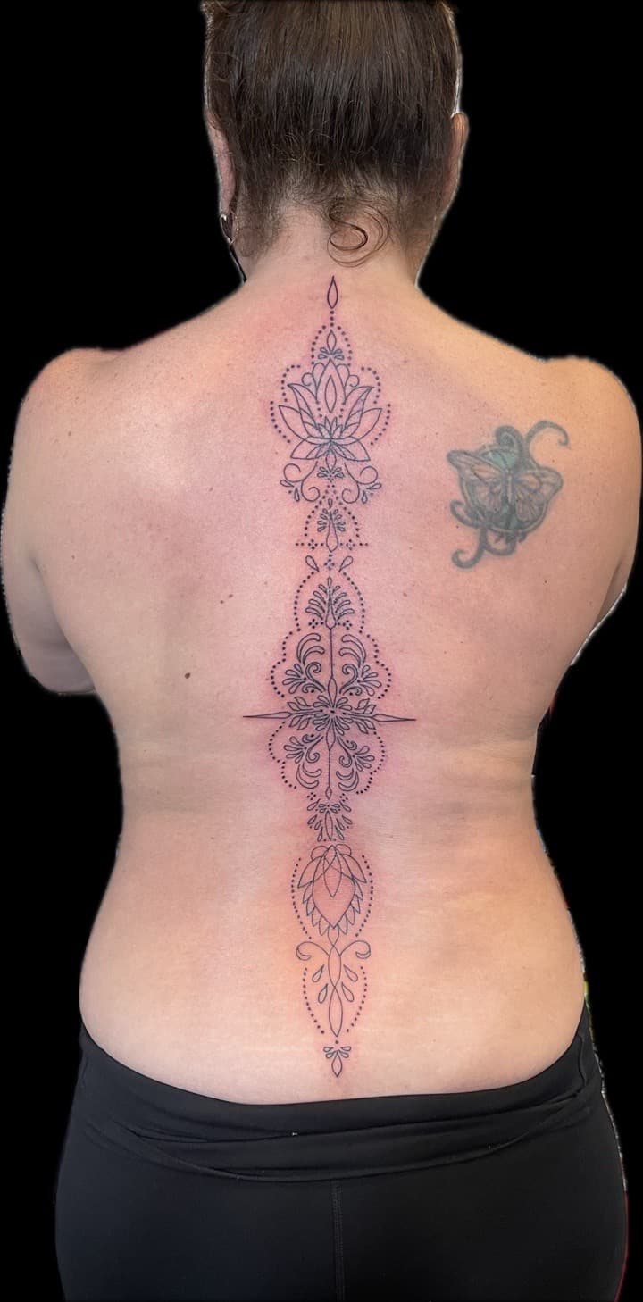 Mandala + Fine Line lotus tattoo on Spine by Carmela_Bella on TattMe