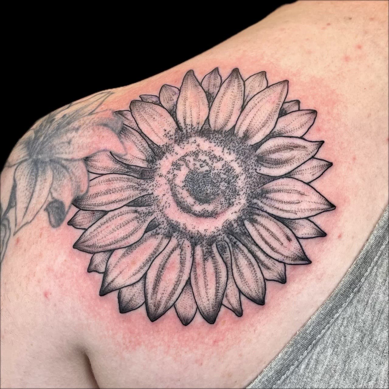 Black-work + Dot-work sunflower tattoo on Shoulder Blade by Carmela_Bella on TattMe