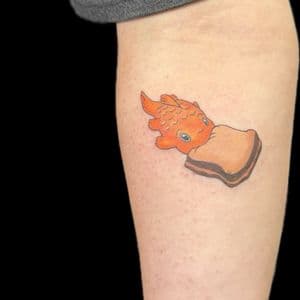 Color + Cartoon fish tattoo on Forearm by Carmela_Bella on TattMe