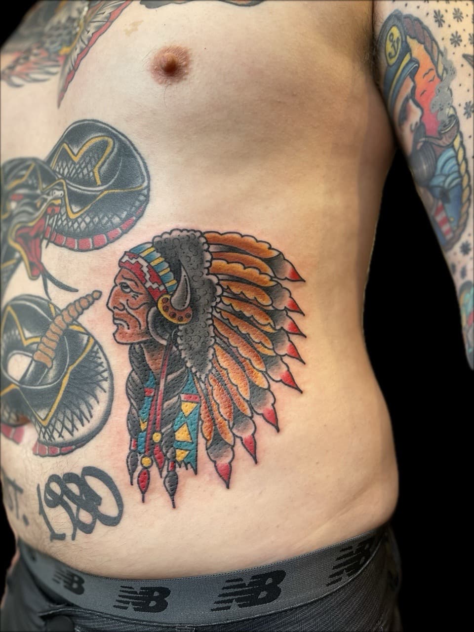 Traditional + American Traditional native american chief tattoo on Ribs by Carmela_Bella on TattMe