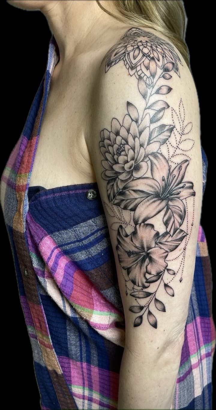 Black & Grey + Floral flowers tattoo on Upper Arm by Carmela_Bella on TattMe