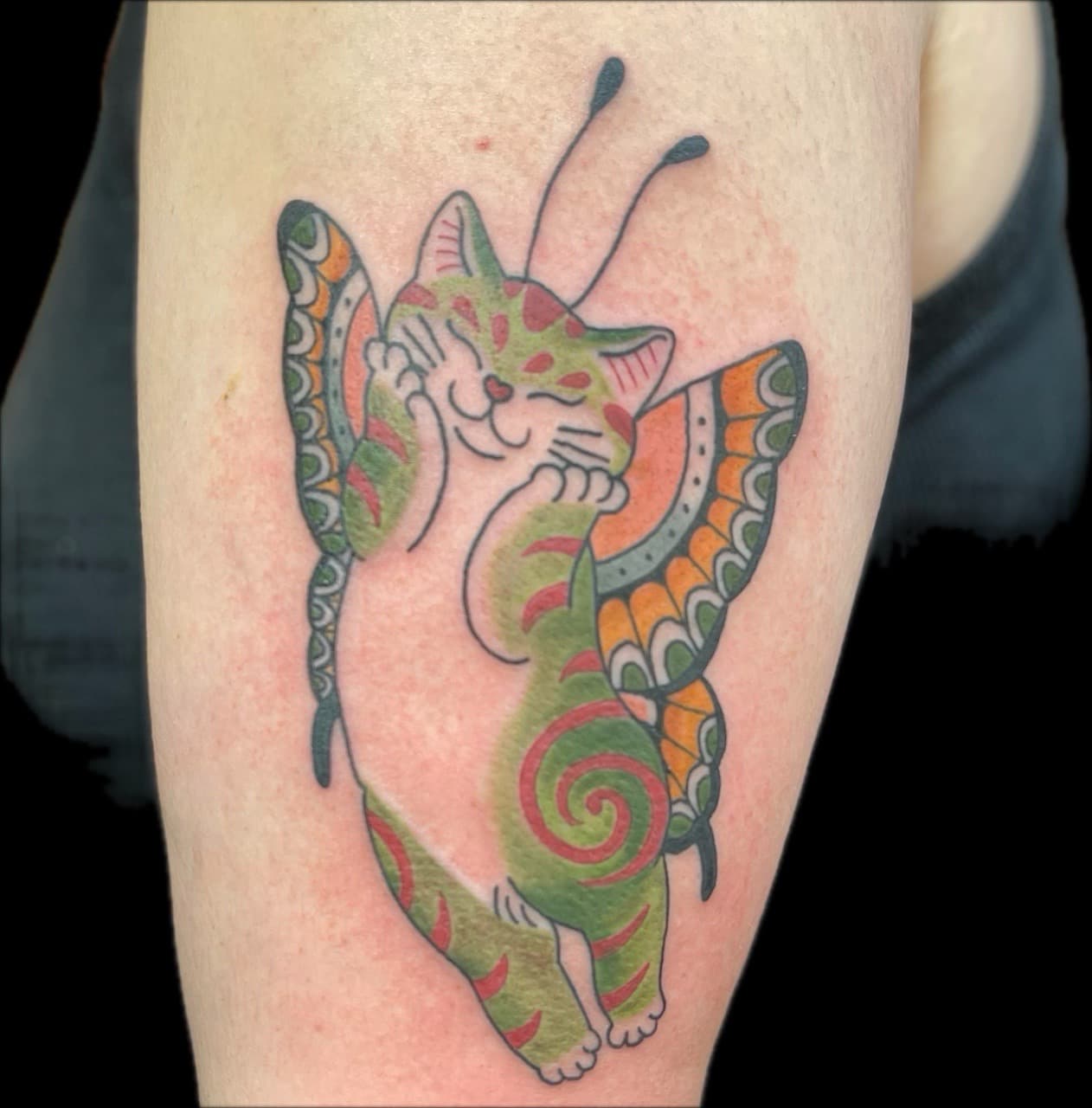 Color + New School cat tattoo on Upper Arm by Carmela_Bella on TattMe