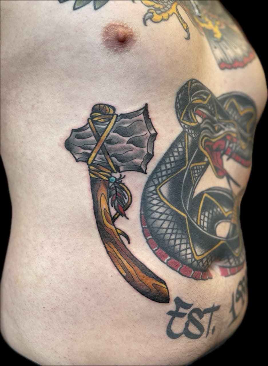 Traditional + American Traditional axe tattoo on Ribs by Carmela_Bella on TattMe