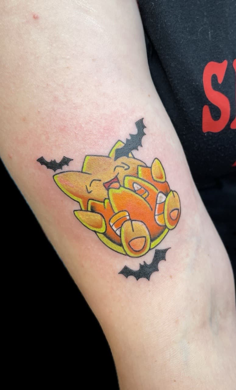 Cartoon + Color pikachu tattoo on Upper Arm by Carmela_Bella on TattMe
