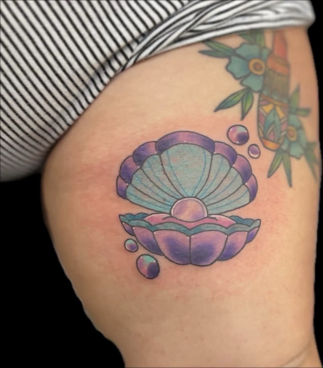 Traditional + Color clam tattoo on Upper Arm by Carmela_Bella on TattMe