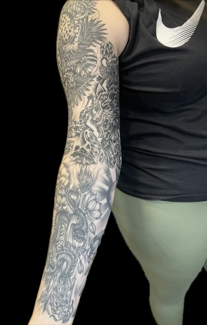 Black & Grey + Illustrative dragon tattoo on Full Sleeve by Carmela_Bella on TattMe