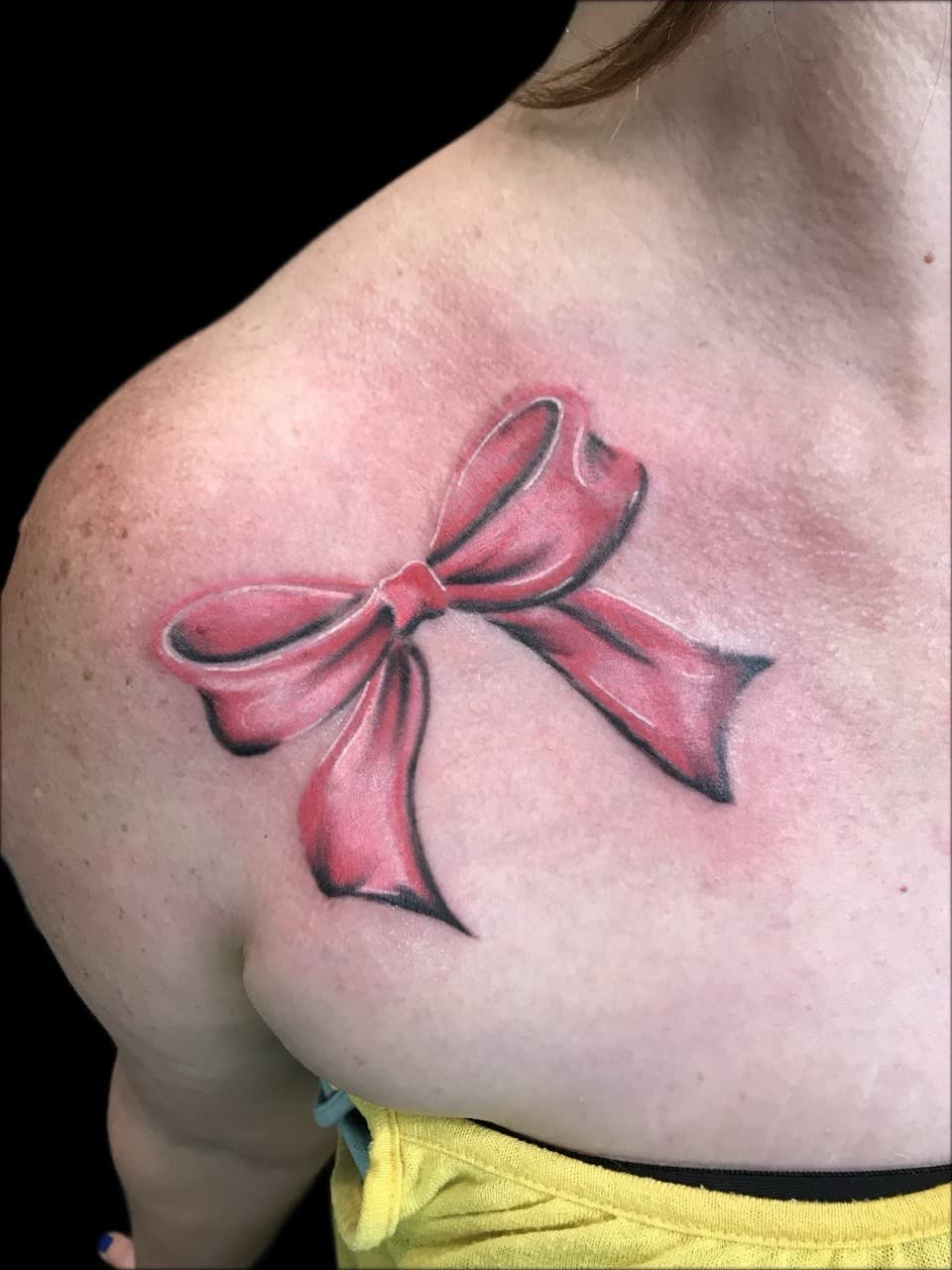 Color + Illustrative bow tattoo on Chest by Carmela_Bella on TattMe