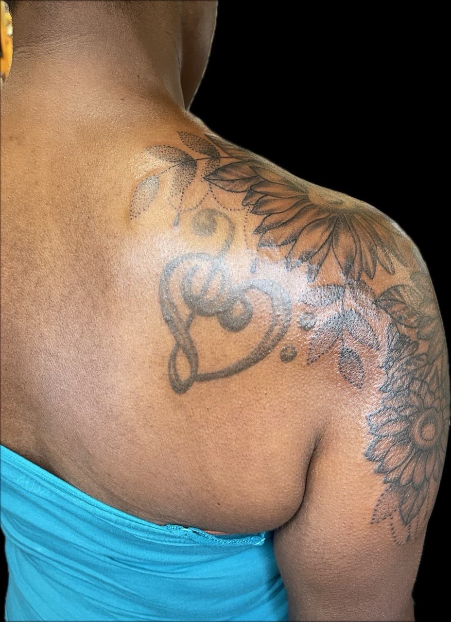 Floral + Line-work sunflowers tattoo on Shoulder Blade by Carmela_Bella on TattMe