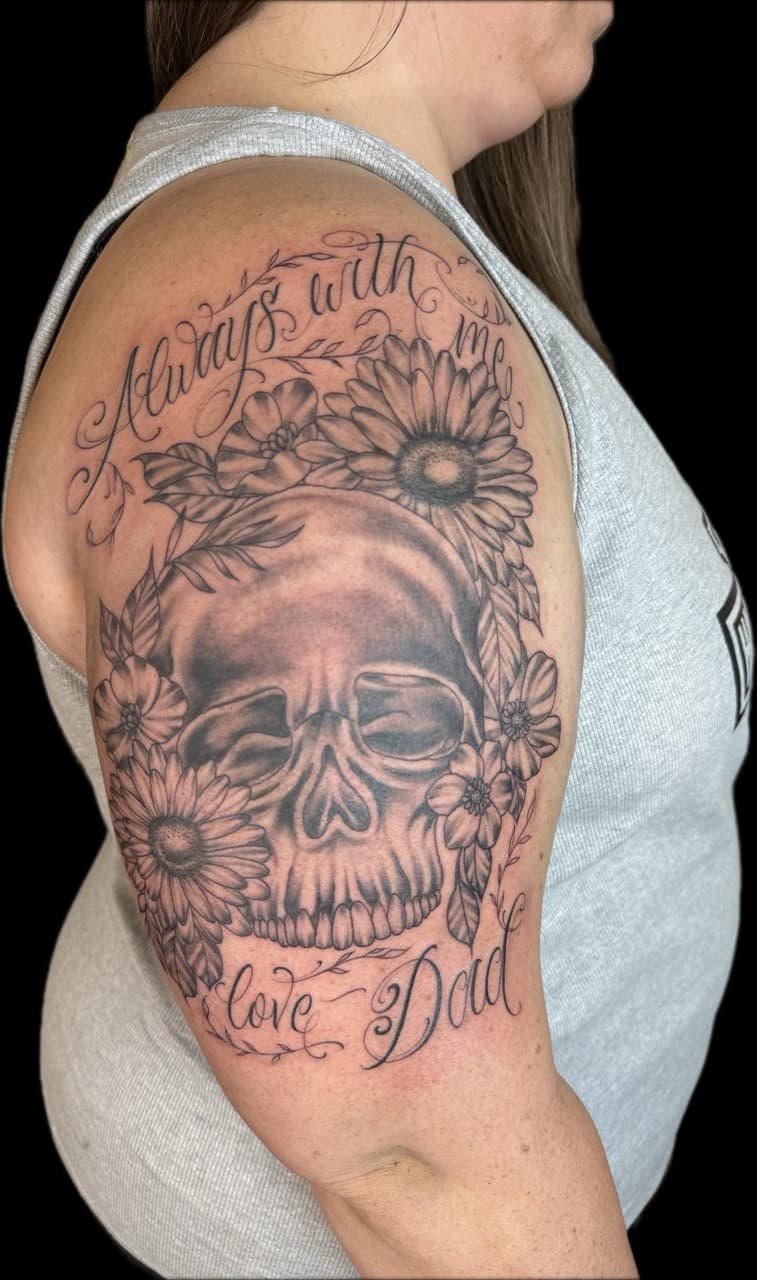 Black & Grey + Floral skull tattoo on Upper Arm by Carmela_Bella on TattMe