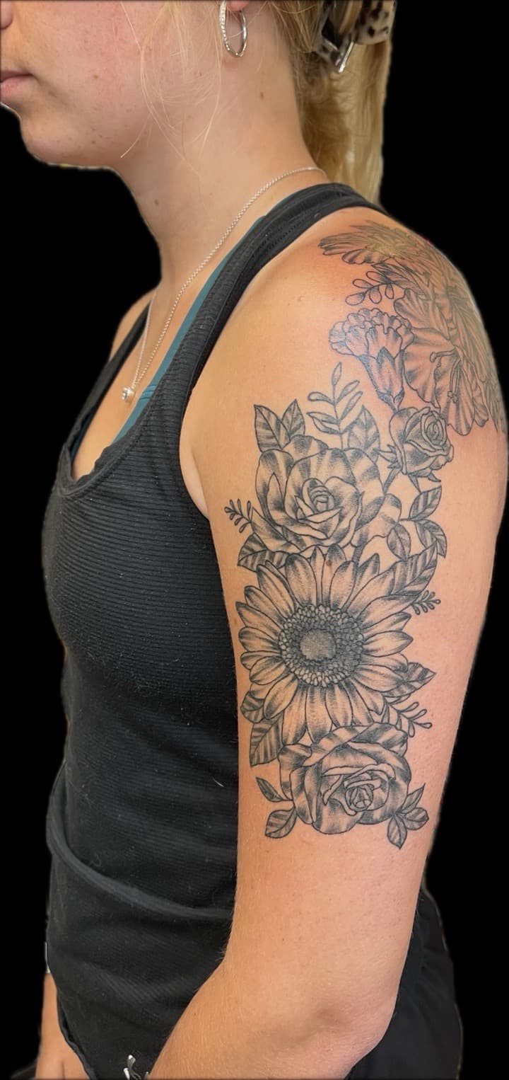 Floral + Black & Grey flowers tattoo on Upper Arm by Carmela_Bella on TattMe