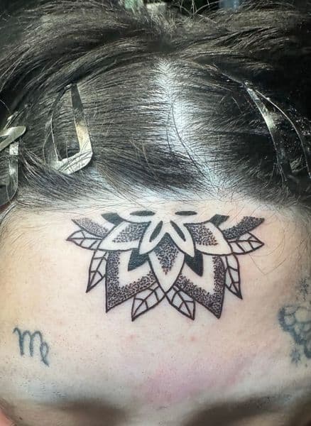 Dot-work + Black-work flower tattoo on Forehead by Jr on TattMe