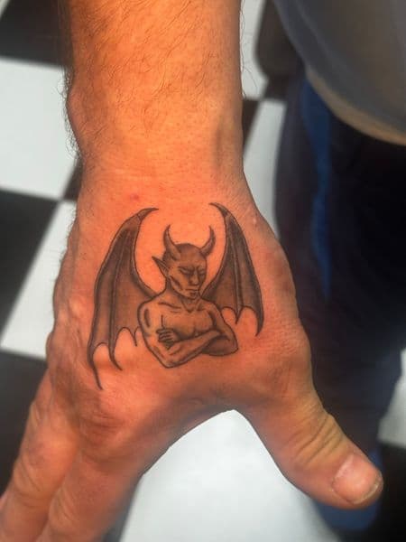 Black & Grey + Illustrative gargoyle tattoo on Hand by Jr on TattMe