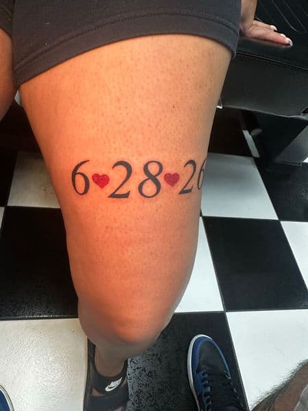 Lettering + Fine Line numbers tattoo on Thigh by Jr on TattMe