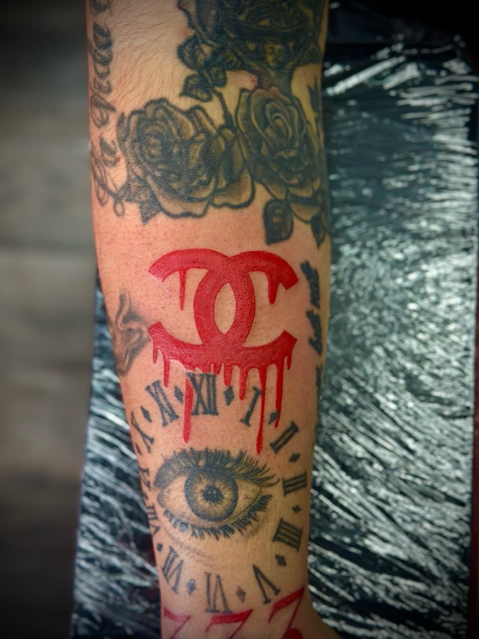 Color + Black & Grey chanel logo tattoo on Forearm by Jr on TattMe