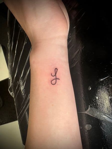 Fine Line + Lettering letter tattoo on Wrist by Jr on TattMe