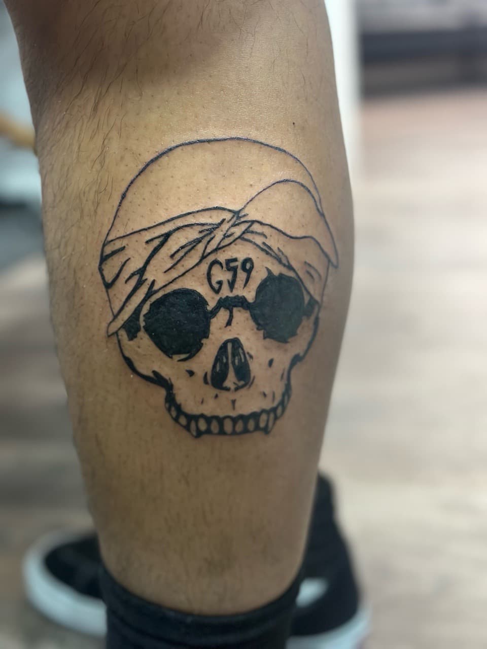 Black-work + Line-work skull tattoo on Calf by Jr on TattMe