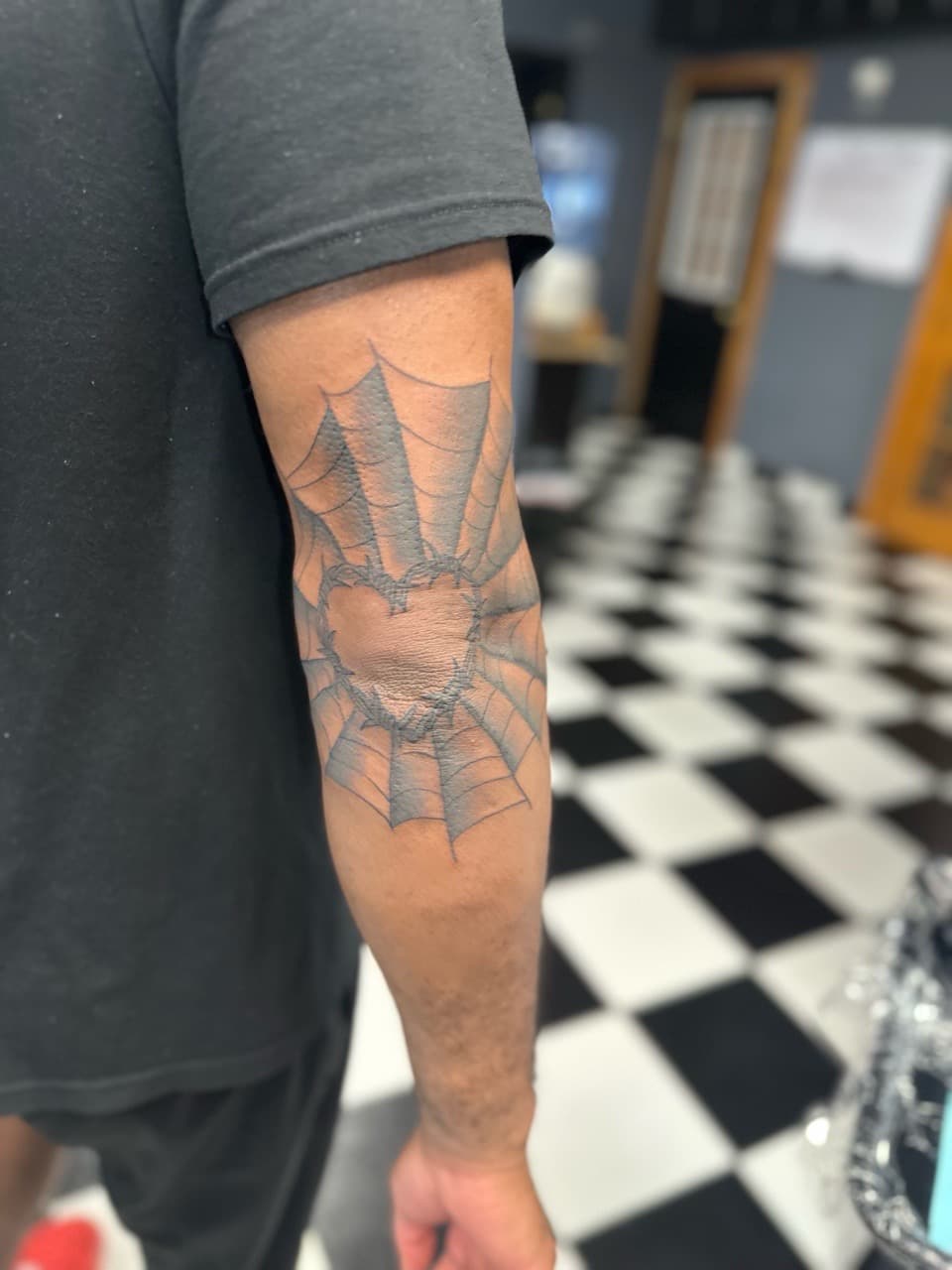 Black & Grey + Line-work spiderweb tattoo on Elbow by Jr on TattMe