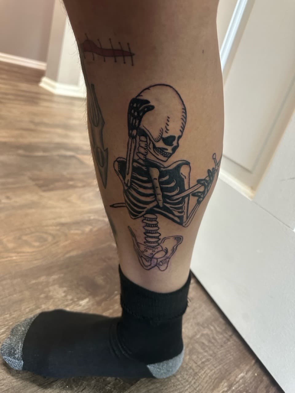 Black-work + Illustrative skeleton tattoo on Calf by Jr on TattMe