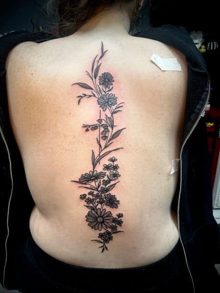 Fine Line + Floral flowers tattoo on Spine by Jr on TattMe