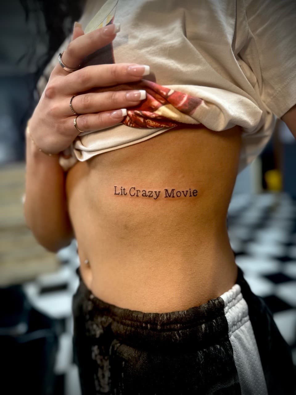 Lettering + Fine Line quote tattoo on Ribs by Jr on TattMe