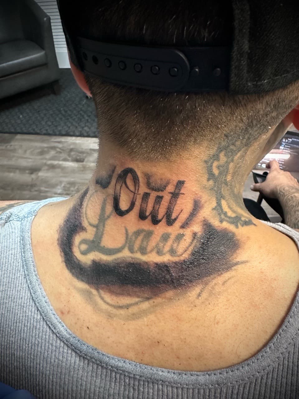 Lettering + Script outlaw tattoo on Neck (Back) by Jr on TattMe