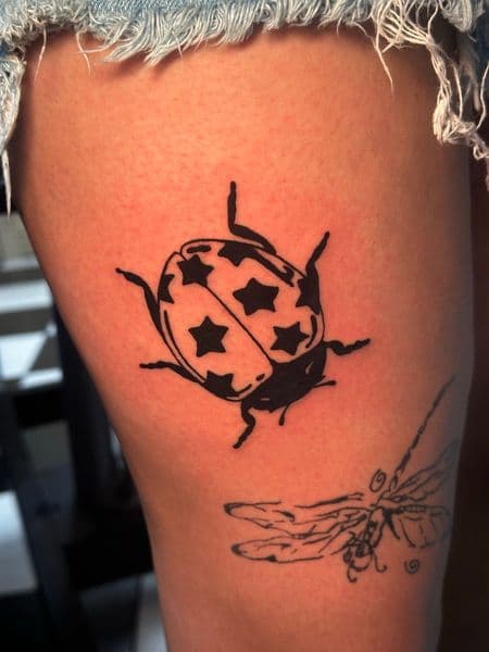 Black-work + Line-work ladybug tattoo on Thigh by Jr on TattMe