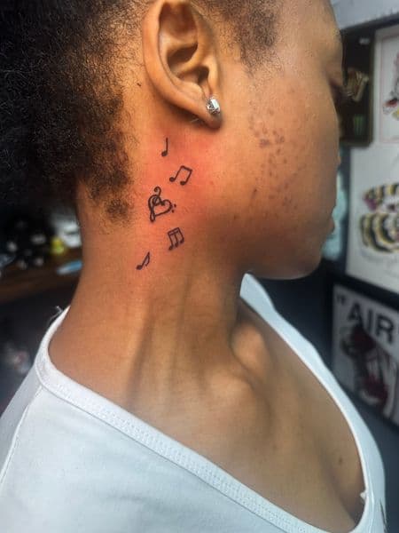 Fine Line + Minimalist musical notes tattoo on Neck (Side) by Jr on TattMe