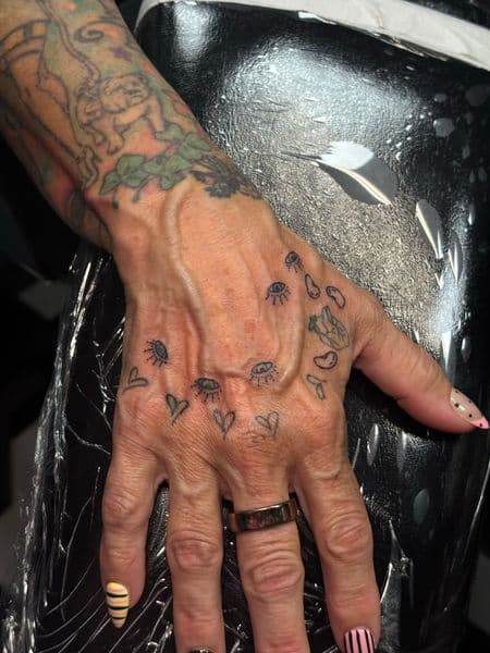 Fine Line + Minimalist eyes tattoo on Hand by Jr on TattMe