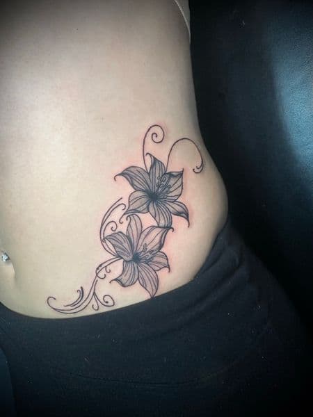 Floral + Black & Grey flowers tattoo on Side (Torso) by Jr on TattMe
