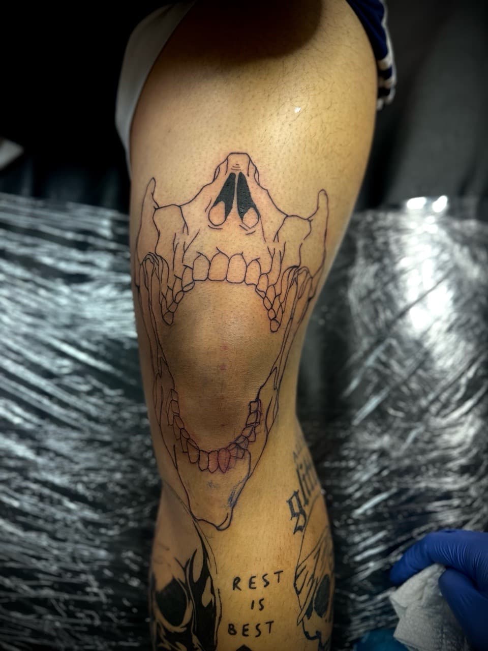 Line-work + Black-work skull tattoo on Knee by Jr on TattMe