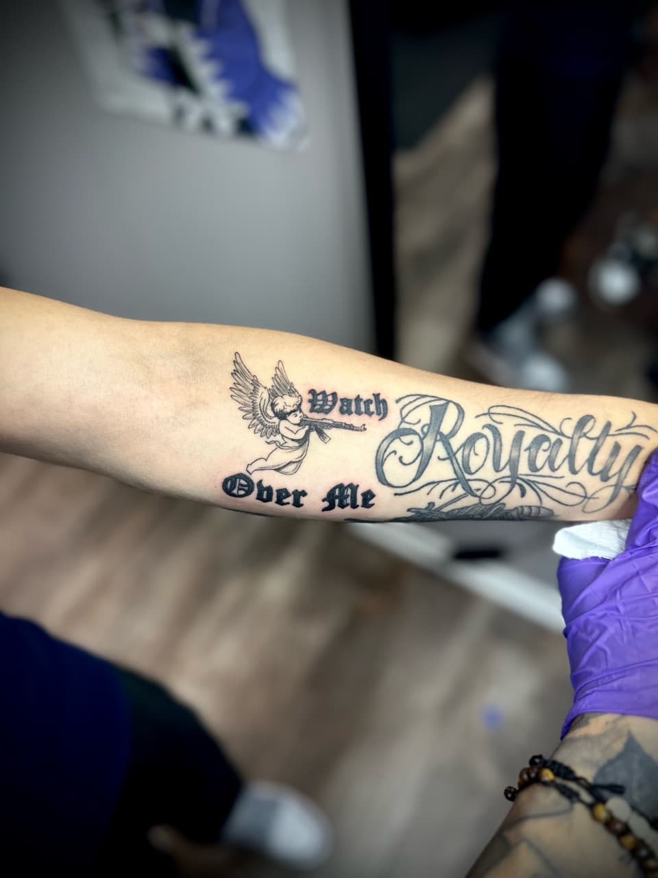 Black & Grey + Lettering angel tattoo on Forearm by Jr on TattMe