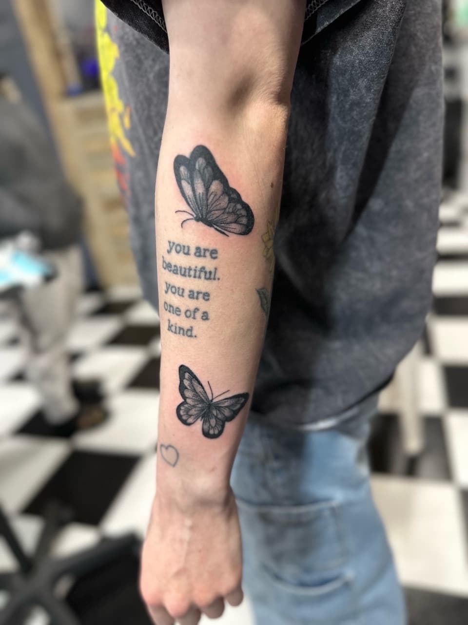 Black & Grey + Lettering butterflies tattoo on Forearm by Jr on TattMe