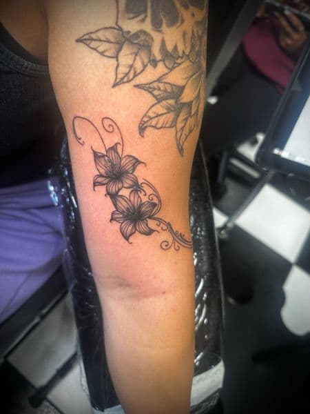 Fine Line + Black-work flowers tattoo on Upper Arm by Jr on TattMe